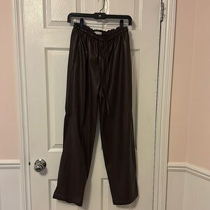 Faux leather pants with drawstring.